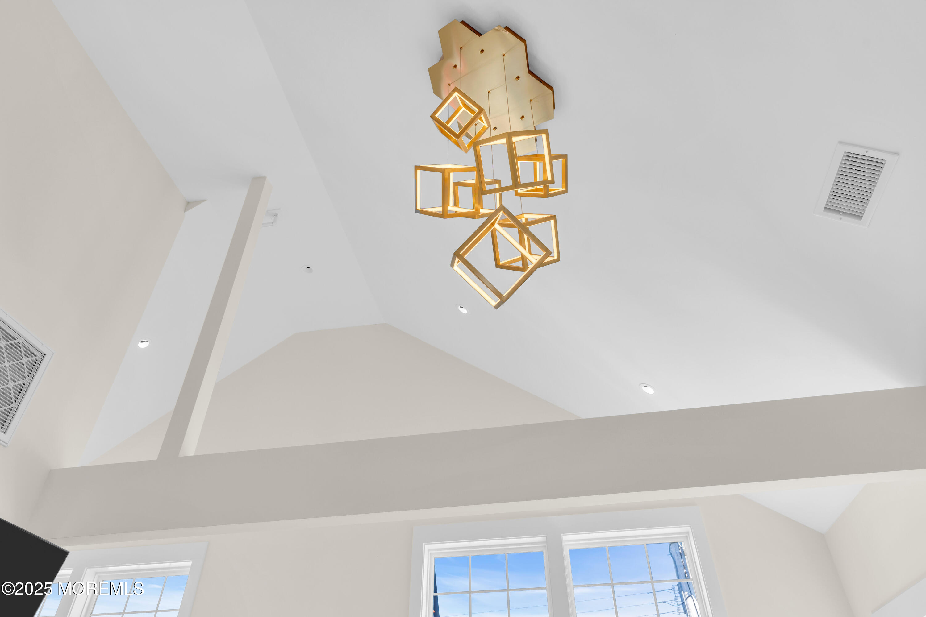 455 East Main Street Manasquan, NJ 08736 - Photo 15 of 47 a close up of a sink a mirror and a painting on the wall