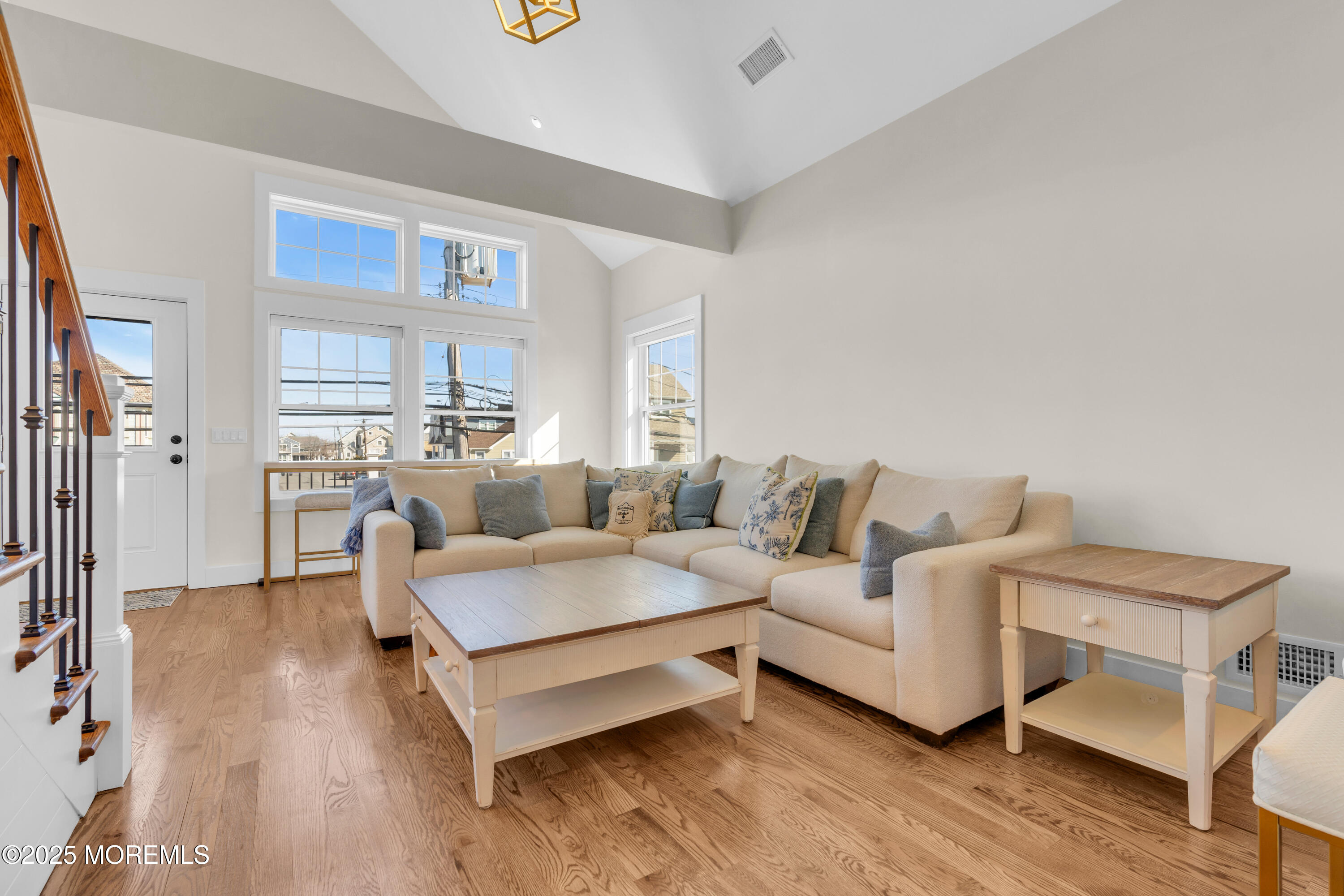 455 East Main Street Manasquan, NJ 08736 - Photo 16 of 47 a living room with furniture and a wooden floor