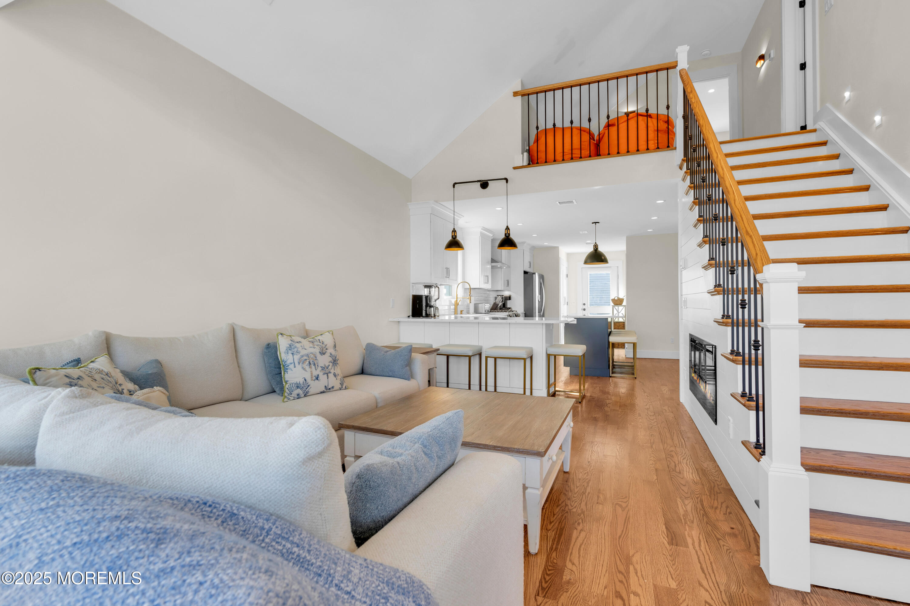 455 East Main Street Manasquan, NJ 08736 - Photo 17 of 47 a living room with furniture and a wooden floor