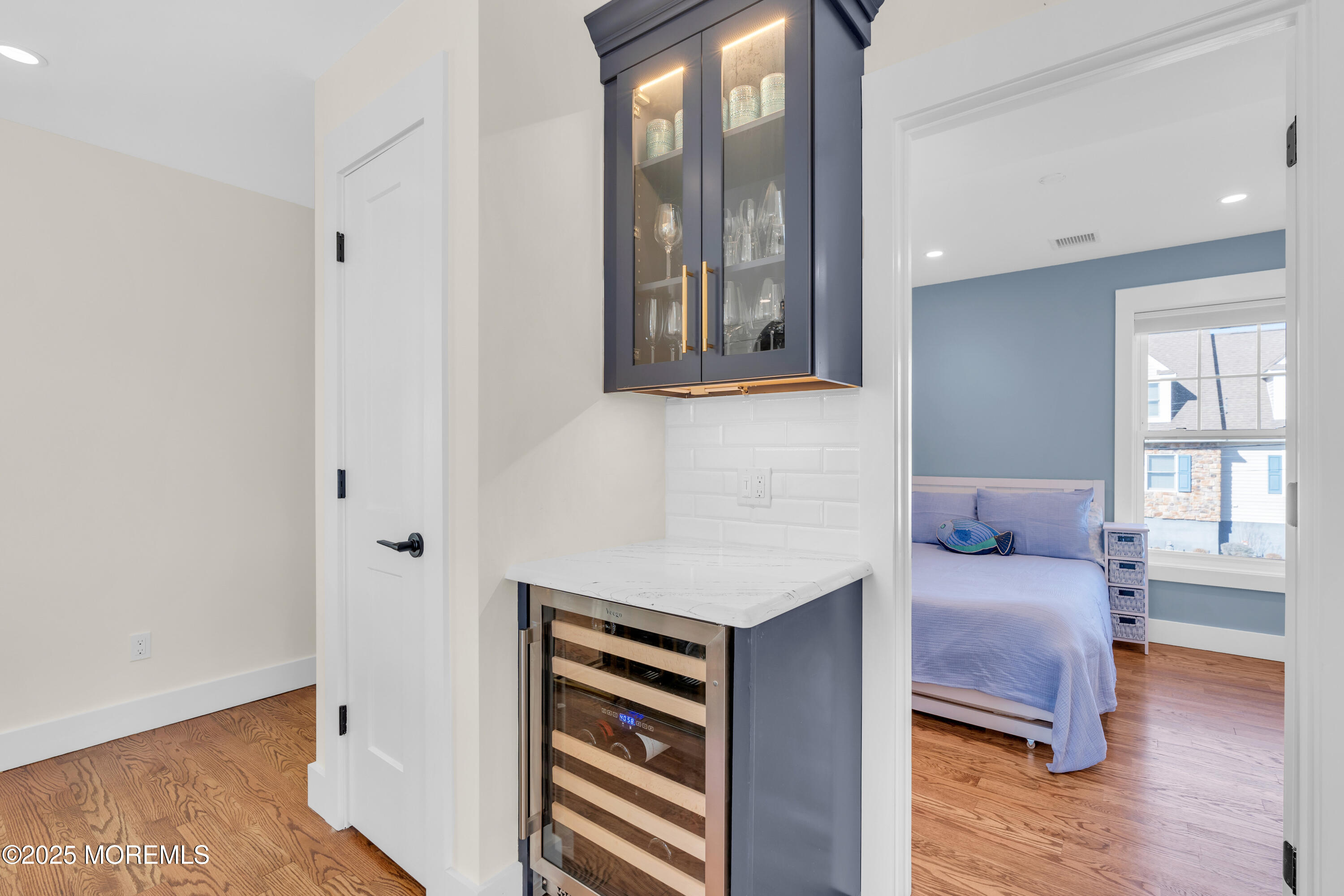 455 East Main Street Manasquan, NJ 08736 - Photo 25 of 47 a bedroom with furniture and wooden floor