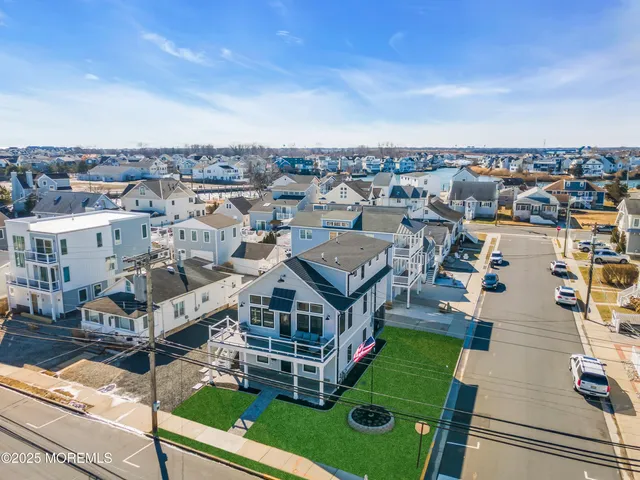 an aerial view of a house with a garden