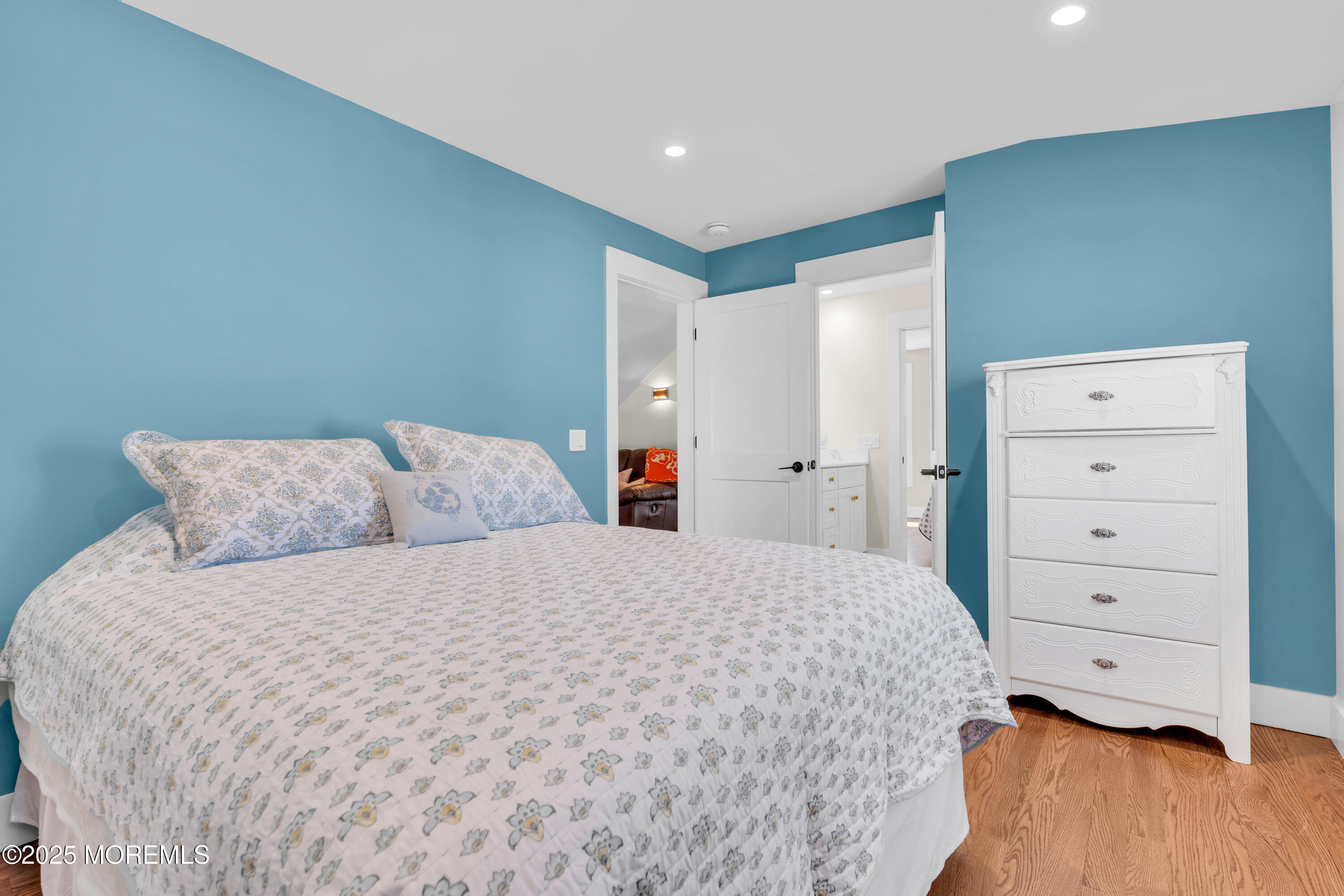 455 East Main Street Manasquan, NJ 08736 - Photo 34 of 47 a bedroom with a bed and a dresser