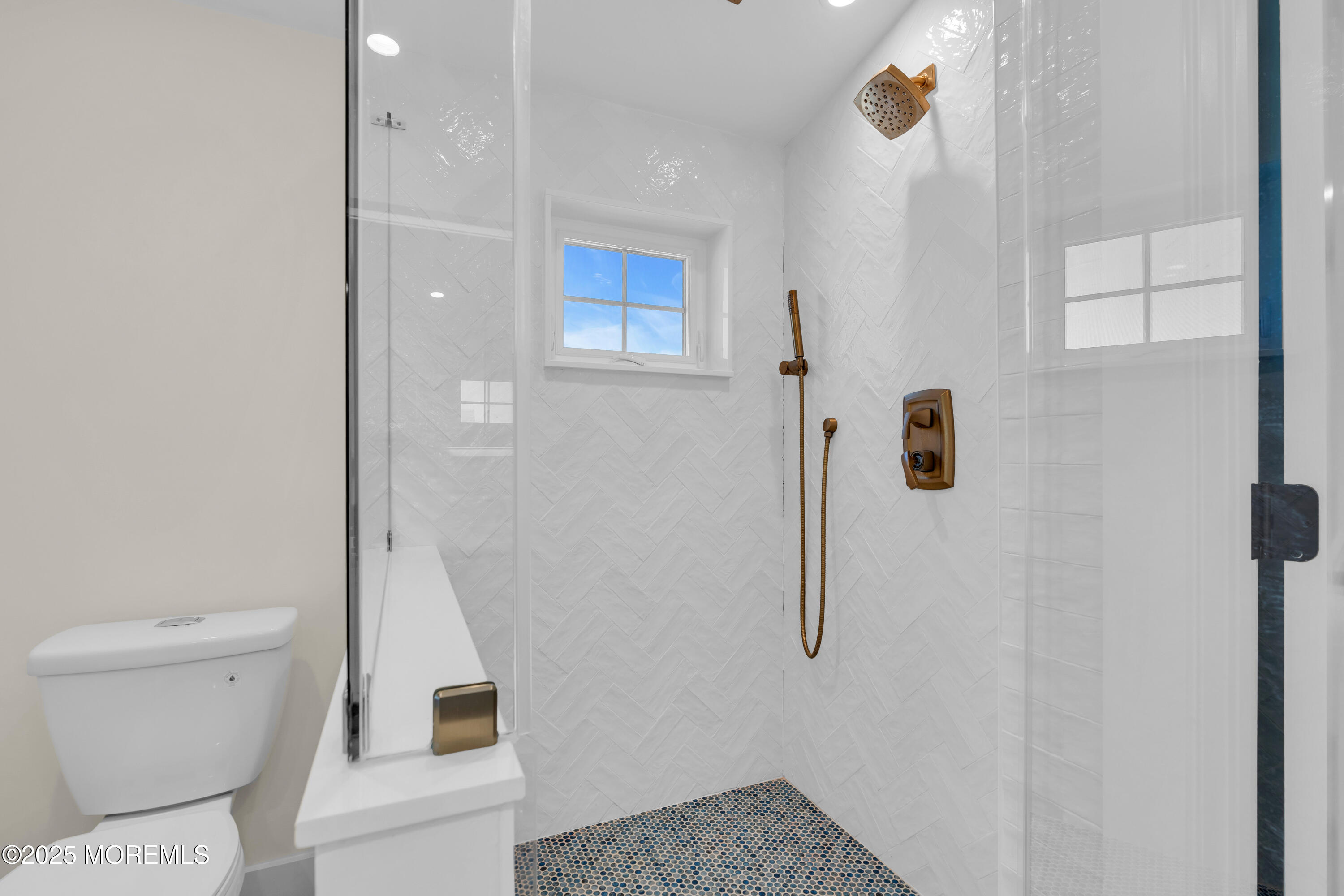 455 East Main Street Manasquan, NJ 08736 - Photo 37 of 47 a bathroom with a toilet and a shower