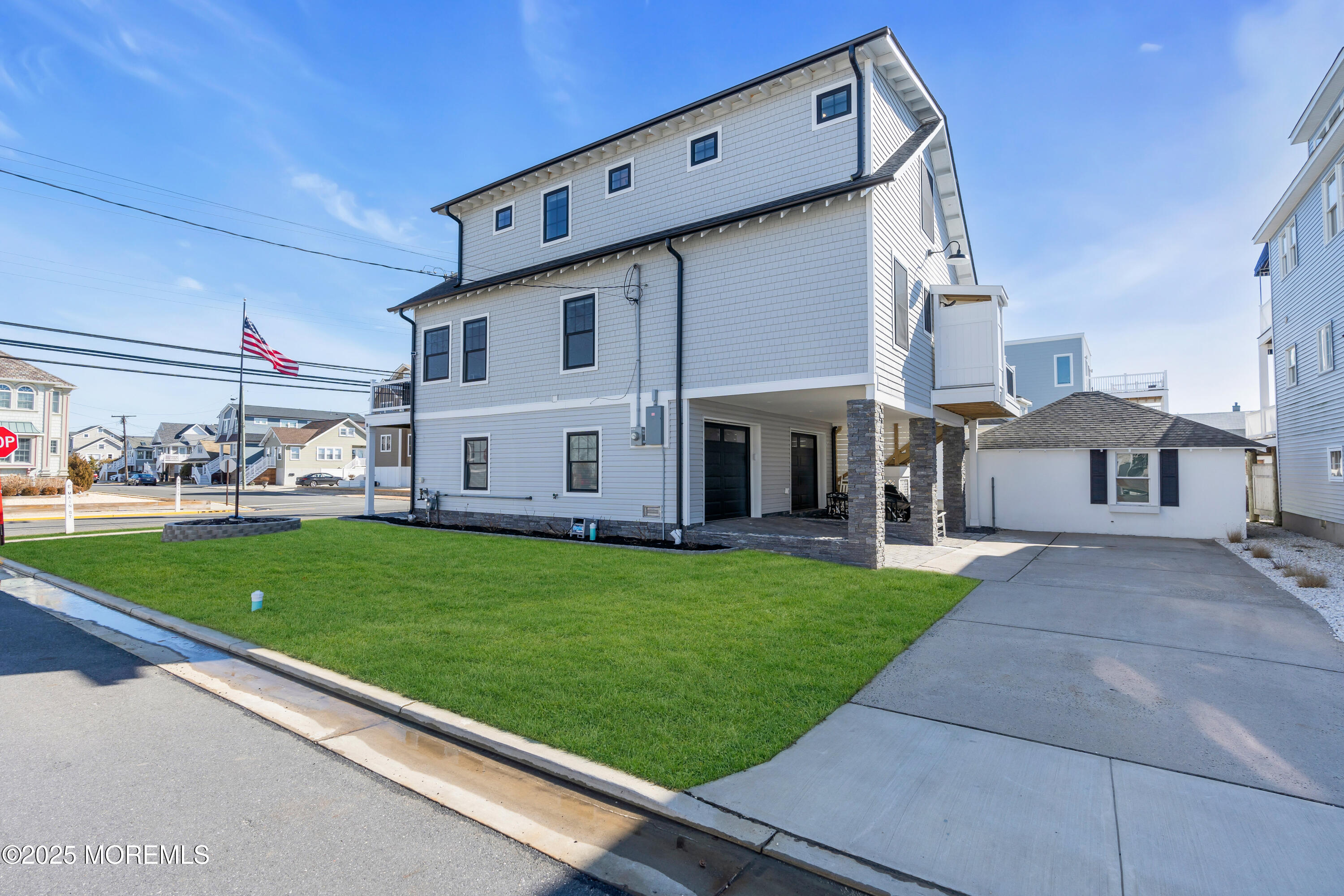 455 East Main Street Manasquan, NJ 08736 - Photo 6 of 47 a view of a back yard of the house