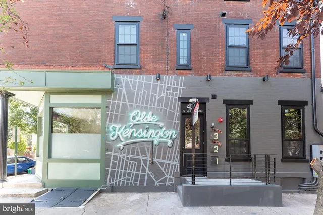 a front view of a building with glass door