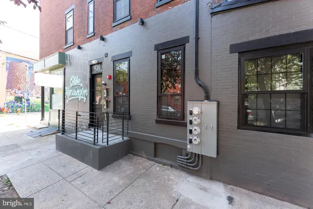 a view of a building with bench