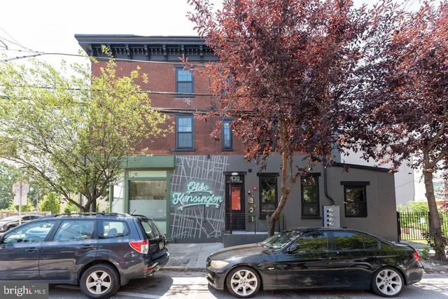 a front view of a house with parking space