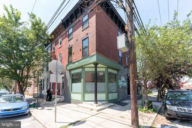 a building on the side of a street