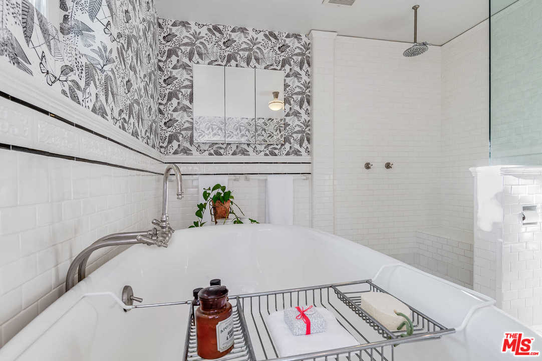 2318 Hollyridge Drive Los Angeles, CA 90068 - Photo 24 of 40 a bathroom with a bathtub and shower