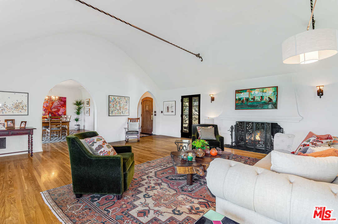 2318 Hollyridge Drive Los Angeles, CA 90068 - Photo 4 of 40 a living room with furniture and a fireplace