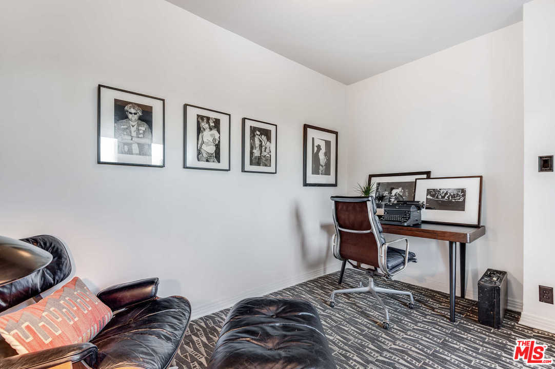 2318 Hollyridge Drive Los Angeles, CA 90068 - Photo 32 of 40 a view of a livingroom with workspace and a couch