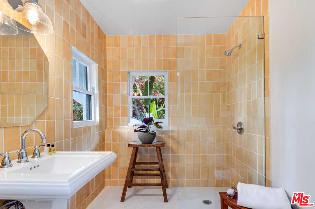 2318 Hollyridge Drive Los Angeles, CA 90068 - Photo 33 of 40 a bathroom with a sink and a shower