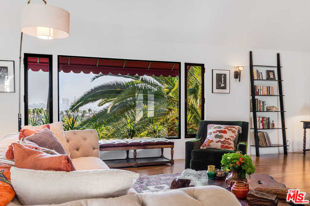 2318 Hollyridge Drive Los Angeles, CA 90068 - Photo 5 of 40 a living room with furniture and a large window