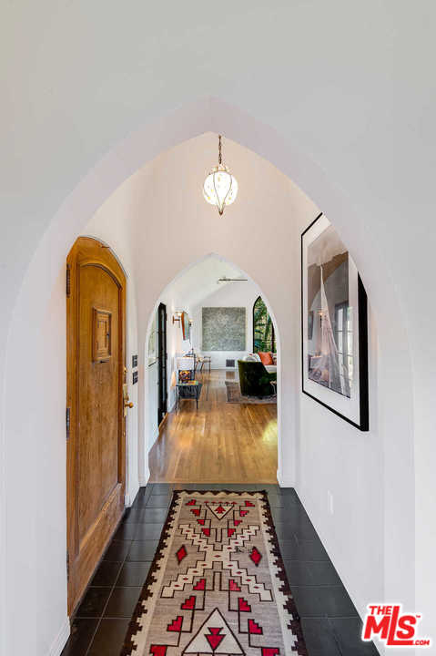2318 Hollyridge Drive Los Angeles, CA 90068 - Photo 8 of 40 a living room with furniture and a fireplace