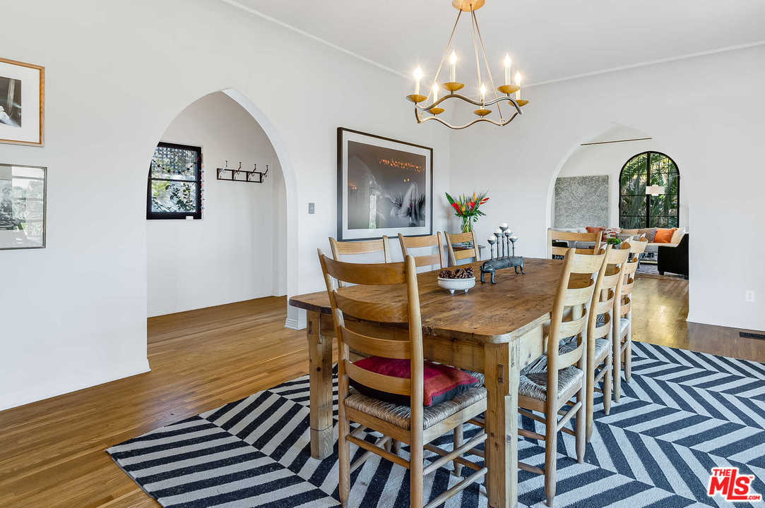 2318 Hollyridge Drive Los Angeles, CA 90068 - Photo 9 of 40 a view of a dining room with furniture and chandelier