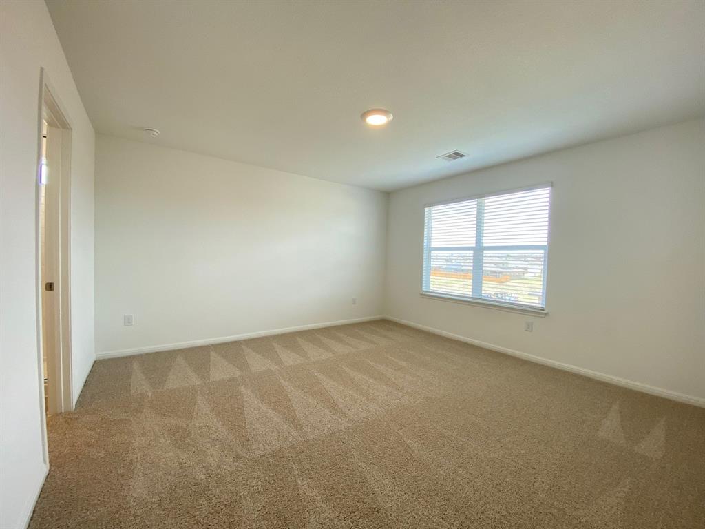 225 Saide Street Georgetown, TX 78626 - Photo 11 of 22 an empty room with a window