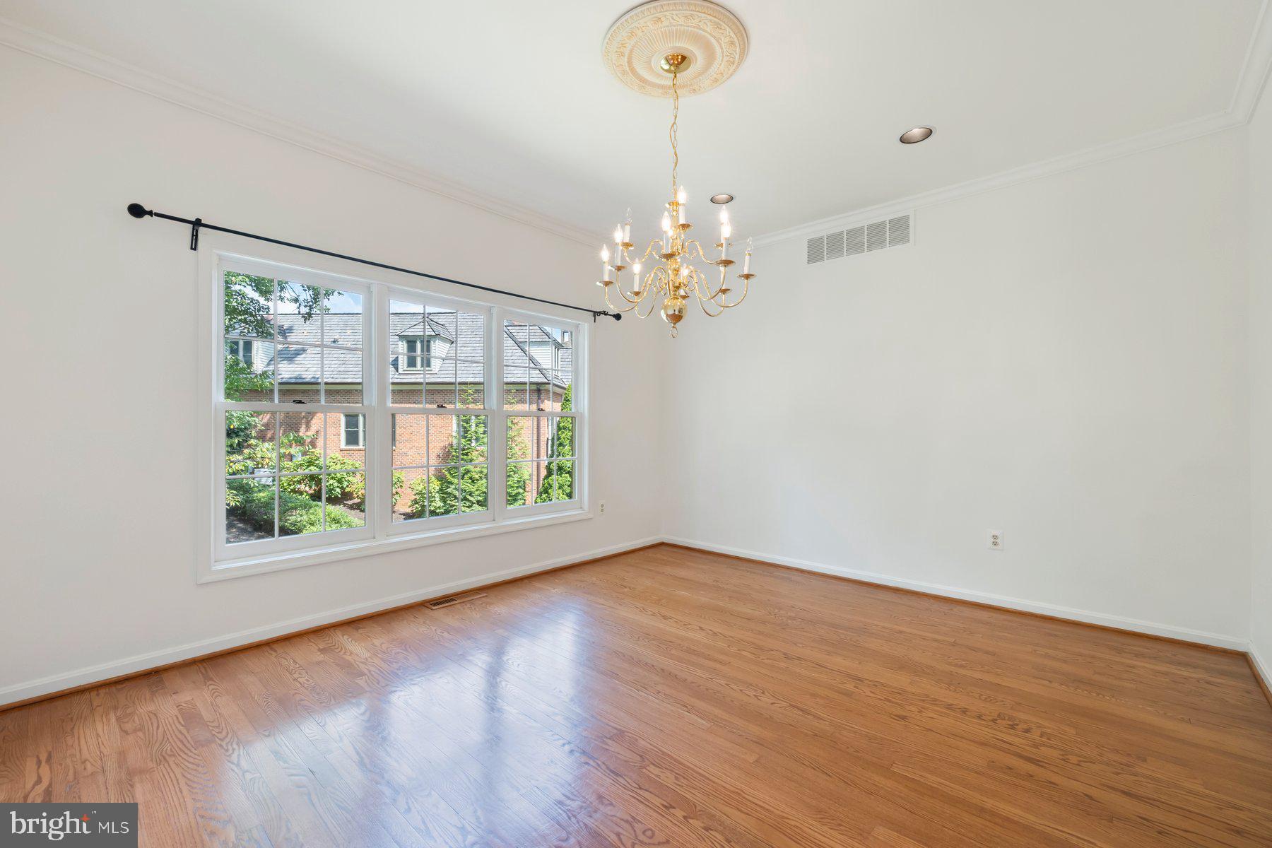 370 South River Landing Road, Unit 370 Edgewater, MD 21037 - Photo 17 of 64 a view of room with window and hardwood floor