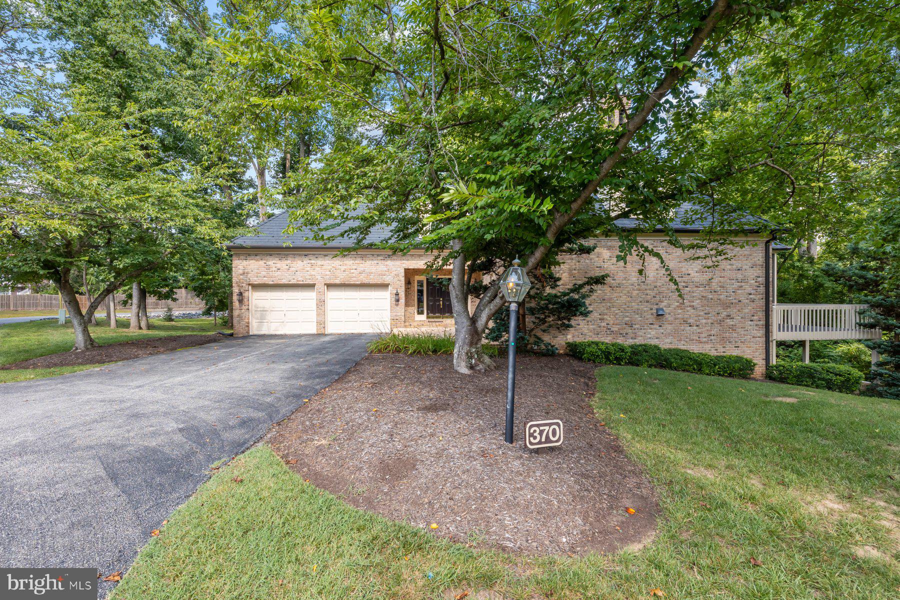 370 South River Landing Road, Unit 370 Edgewater, MD 21037 - Photo 2 of 64 a view of a house with a yard