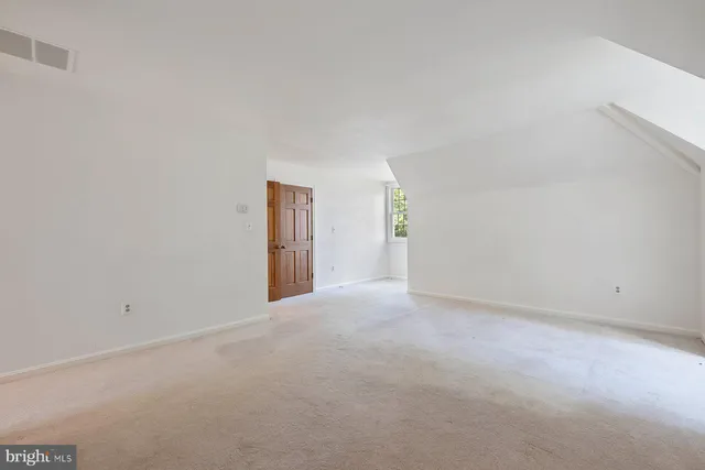 a bathroom with a shower and a toilet