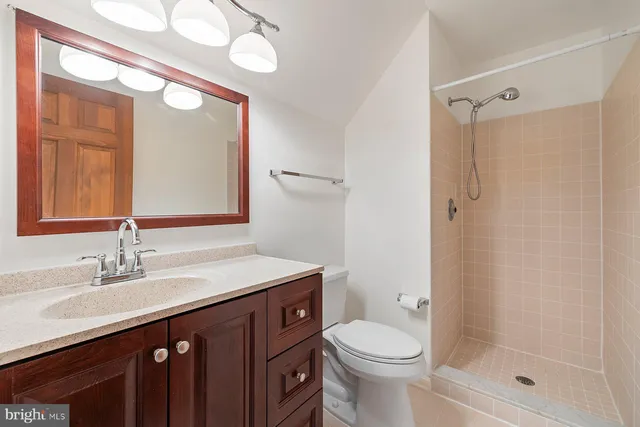 an empty room with windows and mountain view