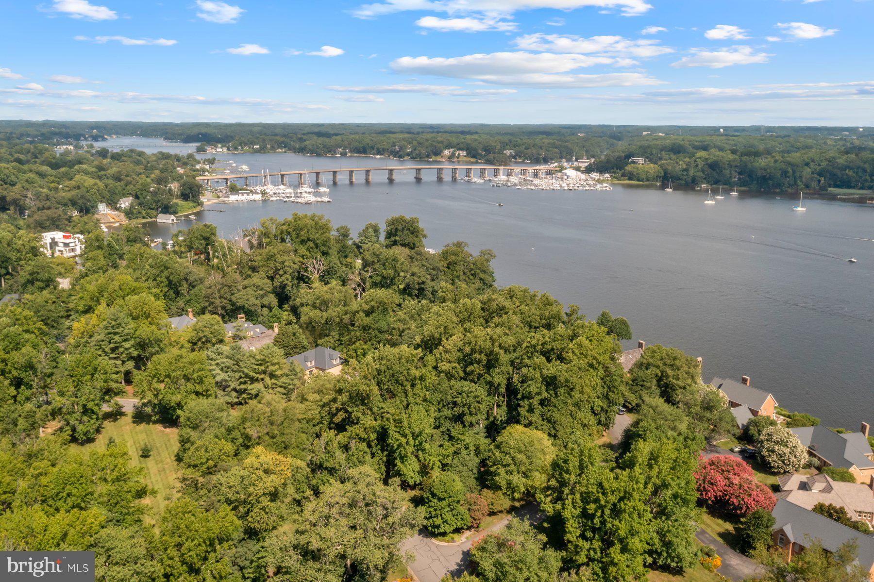 370 South River Landing Road, Unit 370 Edgewater, MD 21037 - Photo 55 of 64 a view of a lake with a city