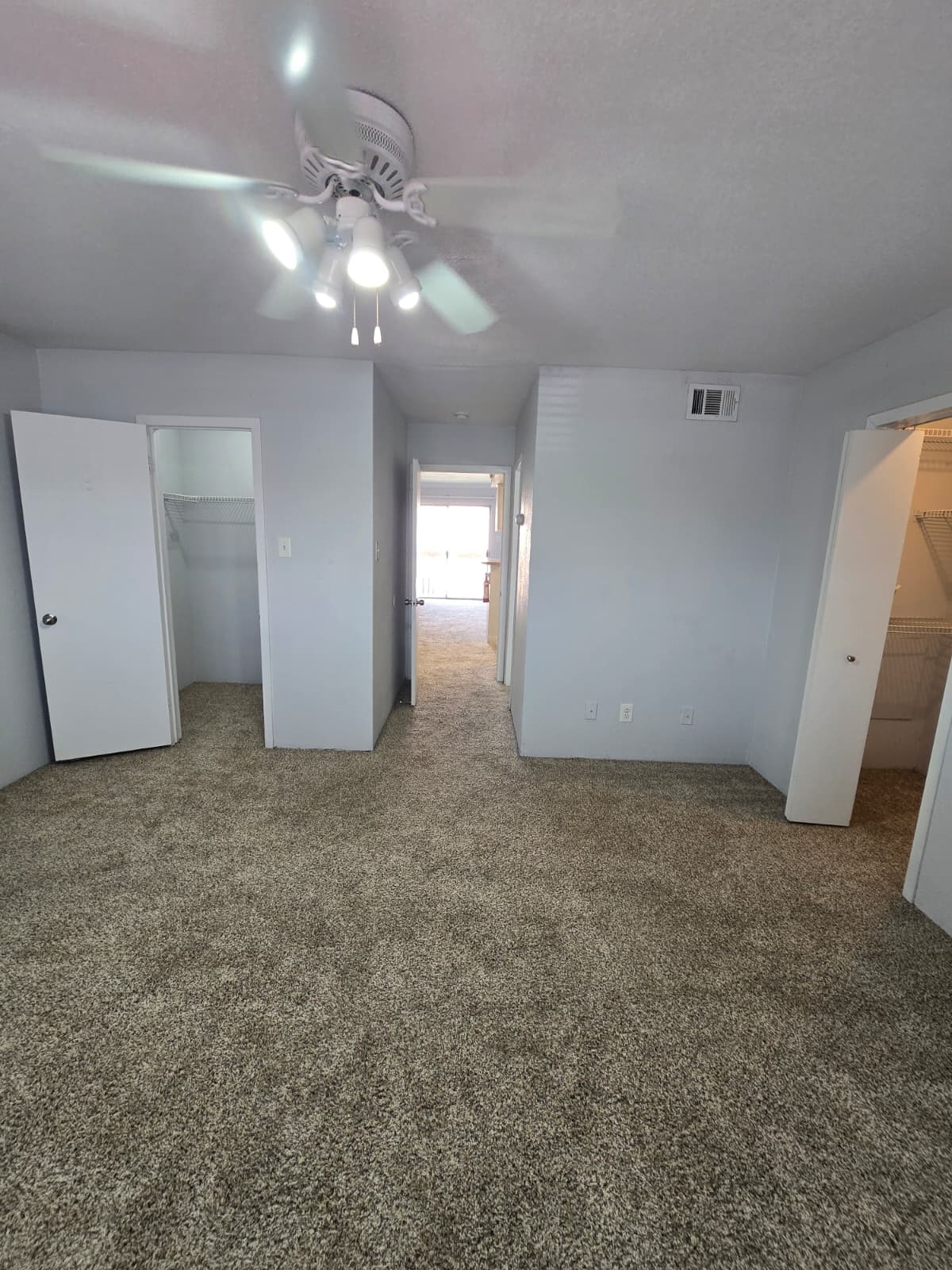 4747 Allendale Road, Unit 8 Houston, TX 77017 - Photo 3 of 11 a view of a big room with chandelier fan and windows