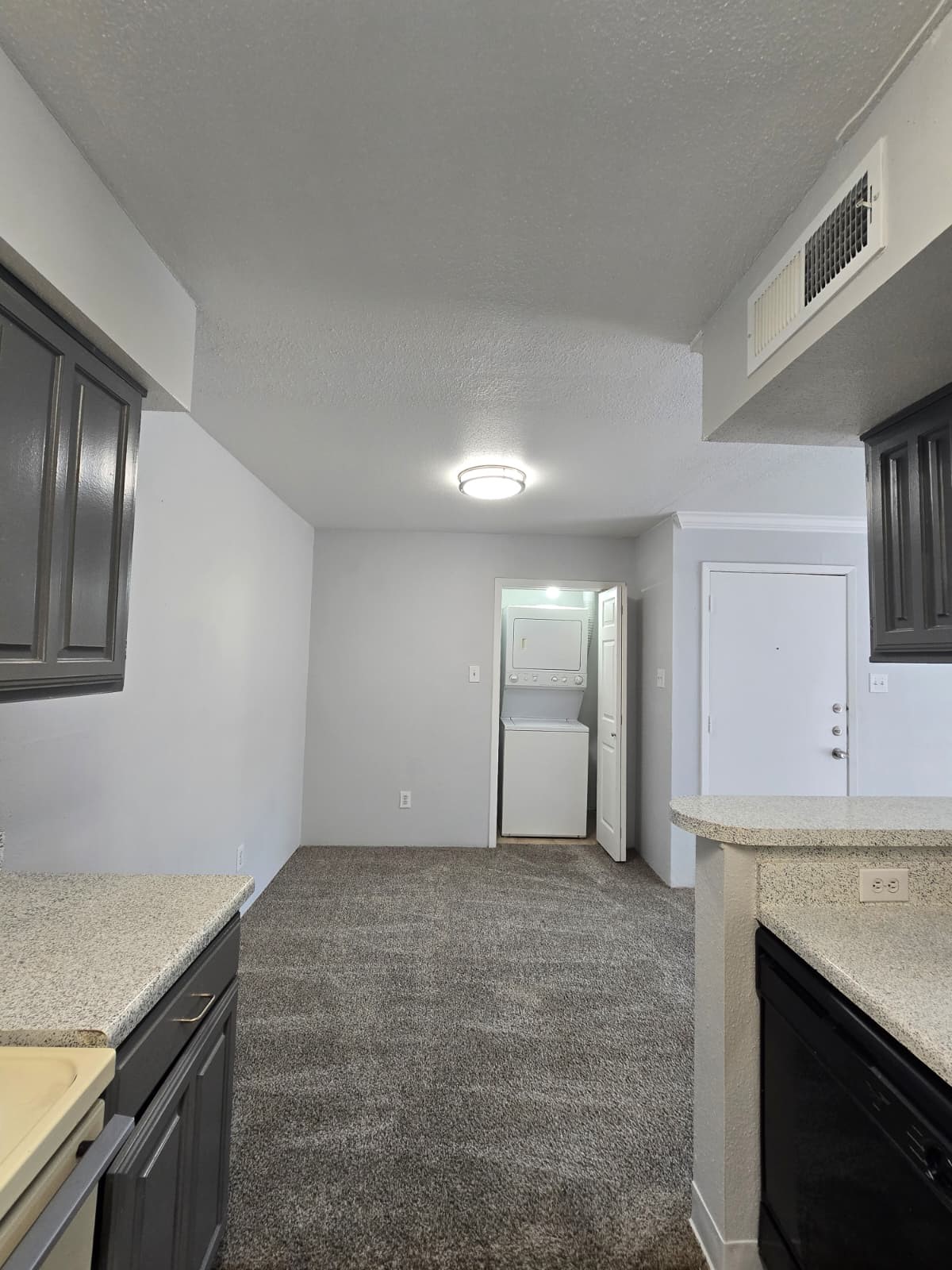 4747 Allendale Road, Unit 8 Houston, TX 77017 - Photo 6 of 11 a view of an empty room with kitchen and fireplace