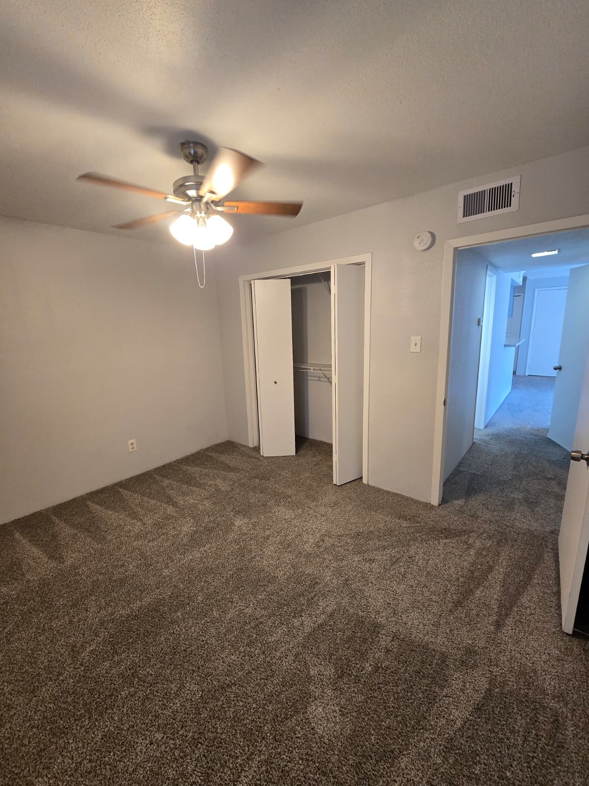 4747 Allendale Road, Unit 8 Houston, TX 77017 - Photo 9 of 11 a view of a big room with chandelier fan