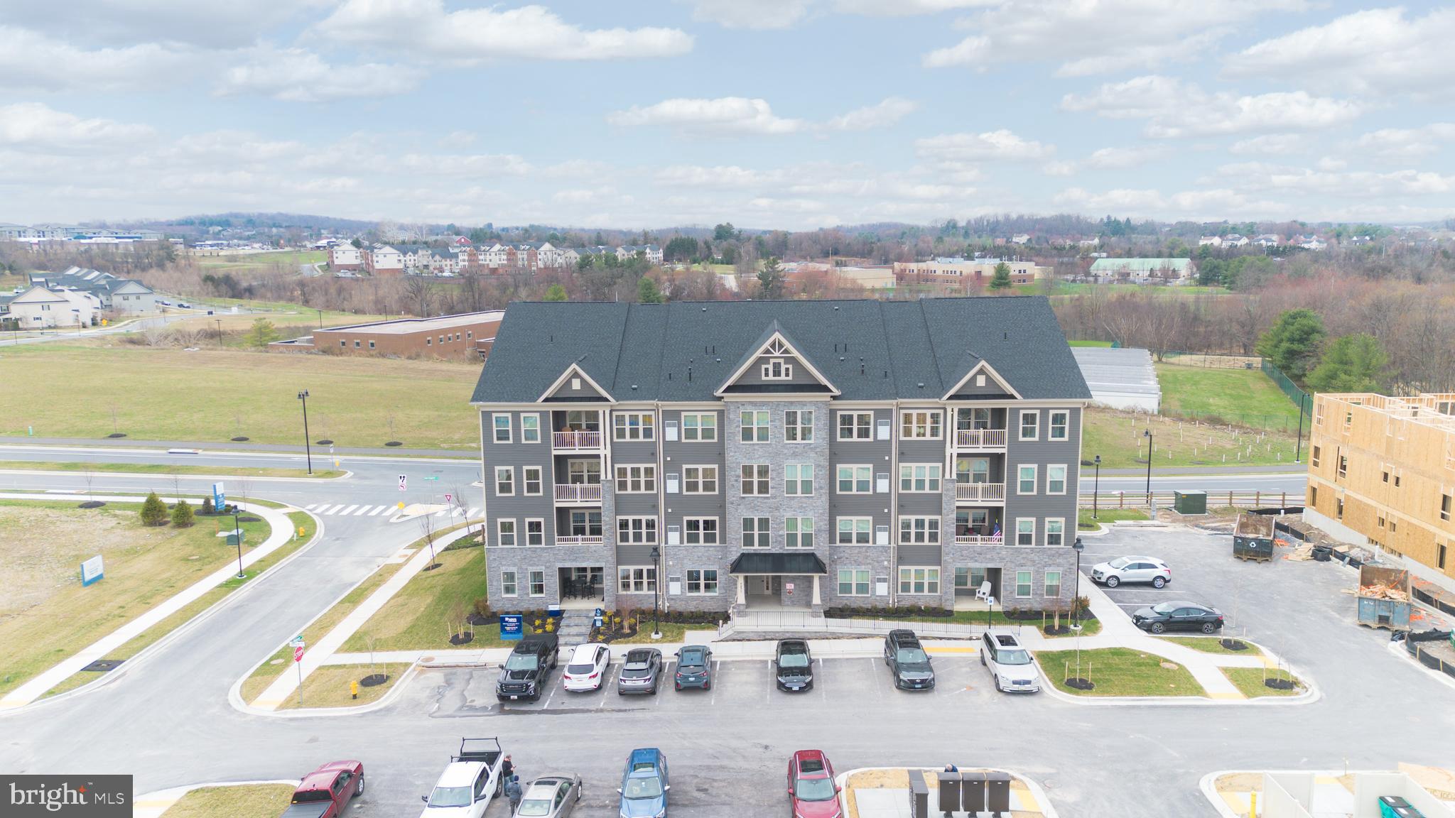 9935 Sofield Place, Unit 201 Frederick, MD 21701 - Photo 2 of 39 a view of city with ocean