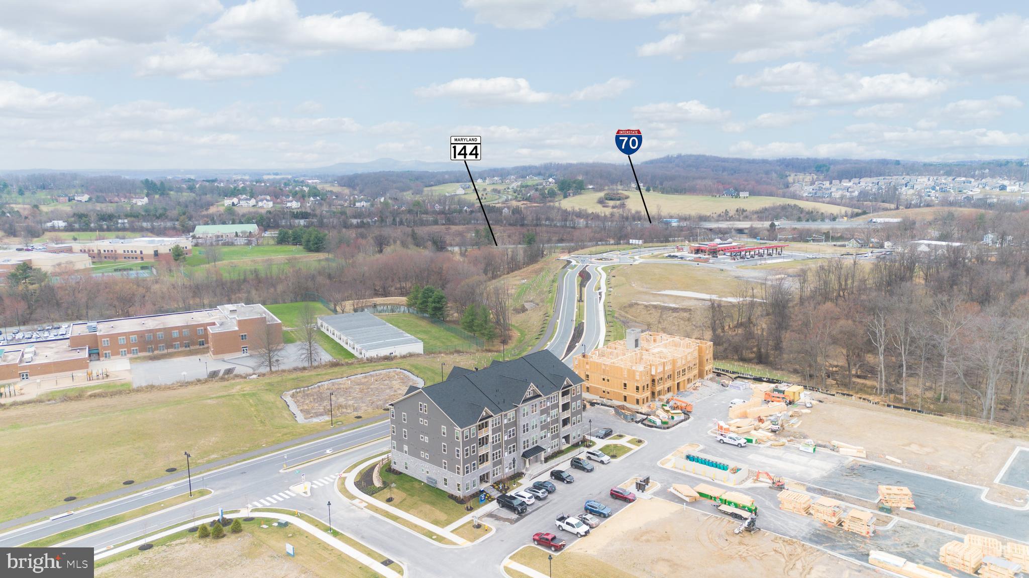 9935 Sofield Place, Unit 201 Frederick, MD 21701 - Photo 3 of 39 a view of a lake