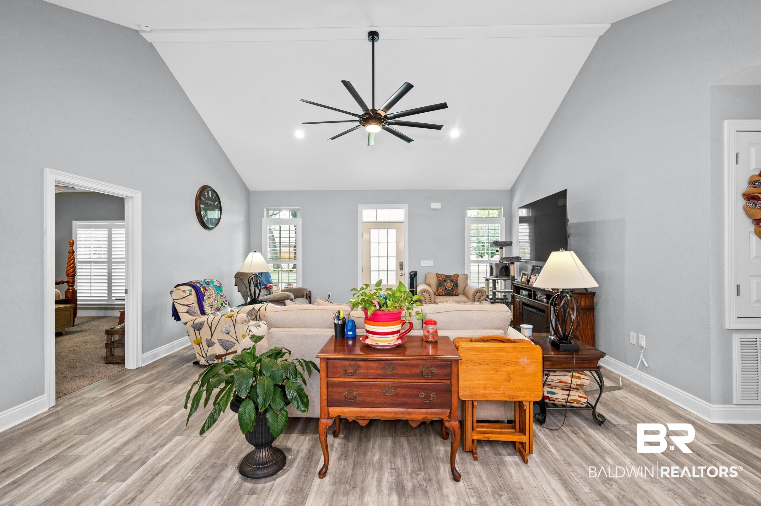 1700 South Juniper Street Foley, AL 36535 - Photo 20 of 51 Living room with light hardwood / wood-style flooring, lofted ceiling, and ceiling fan