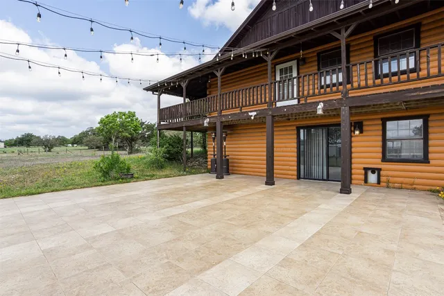 a view of a balcony with an ocean