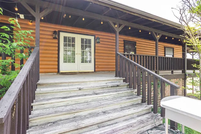 a view of balcony with wooden floor