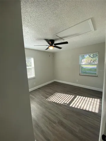 a view of an empty room and window