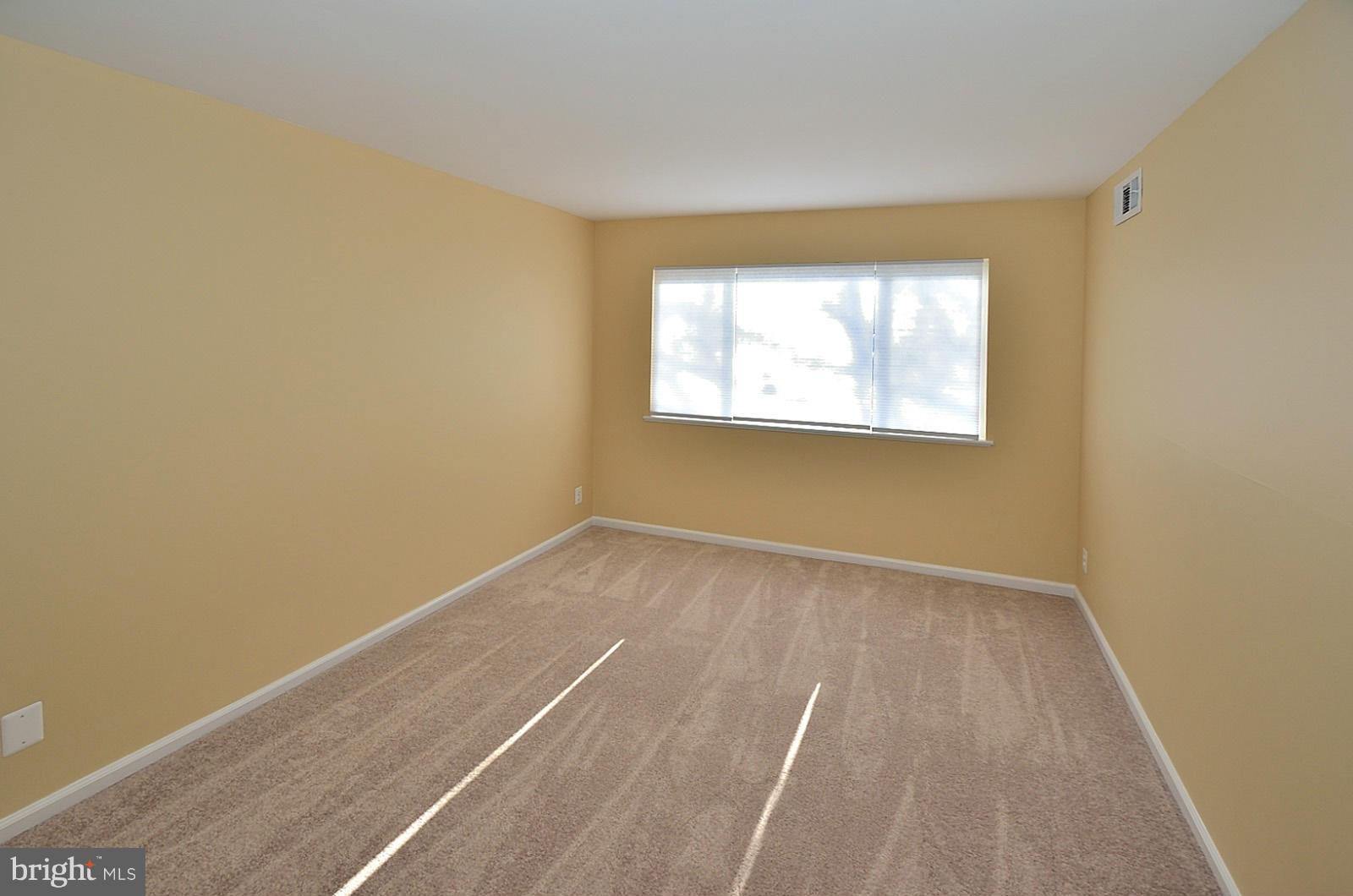 5033 7th Road South, Unit 101 Arlington, VA 22204 - Photo 7 of 13 an empty room with a window