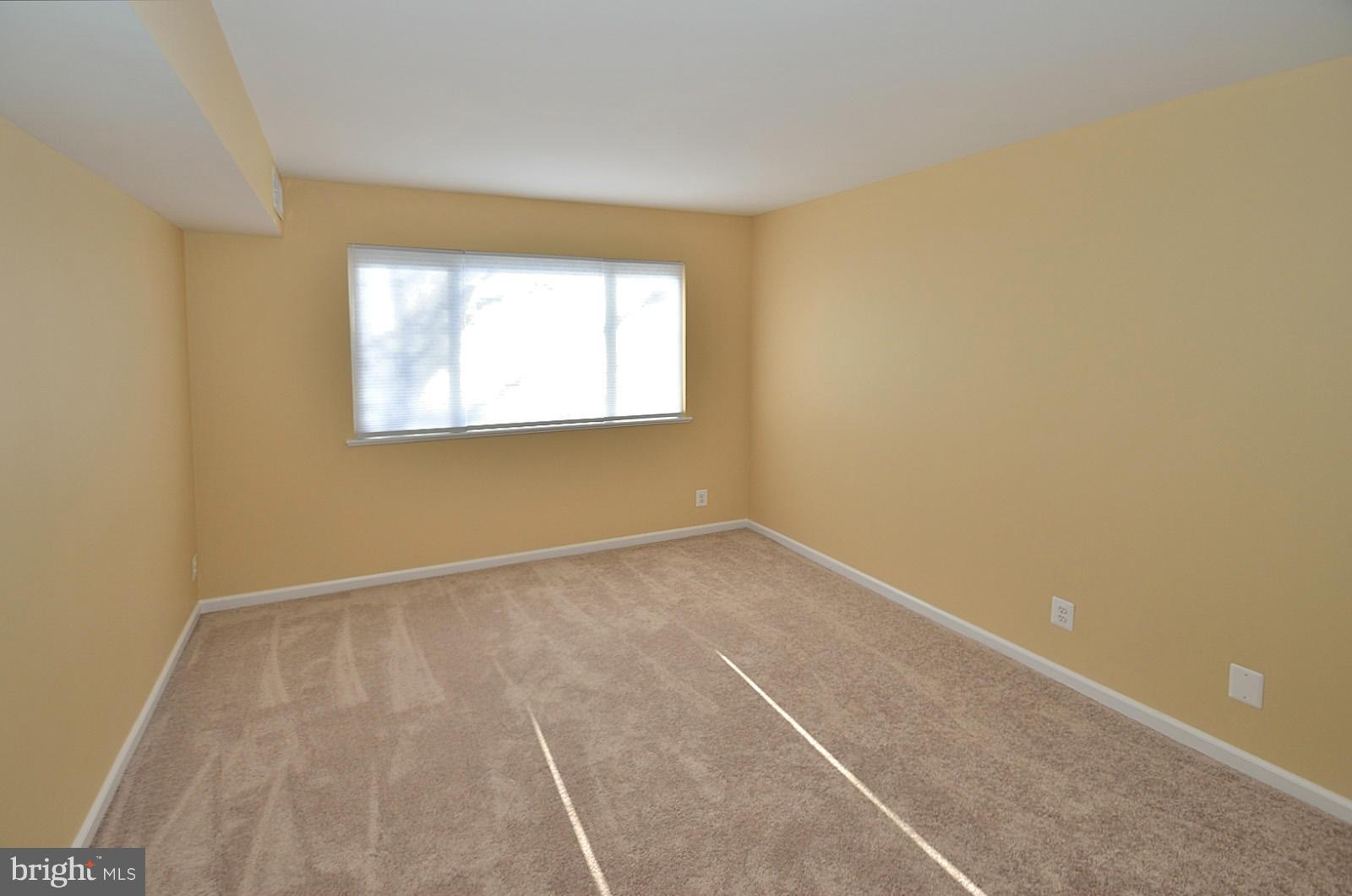 5033 7th Road South, Unit 101 Arlington, VA 22204 - Photo 10 of 13 a view of an empty room with a window