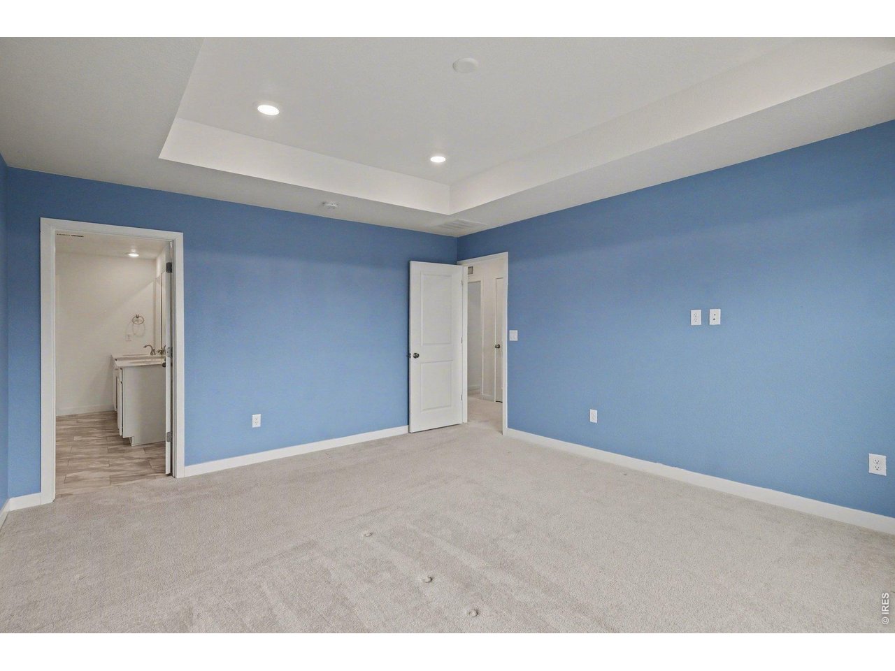 5258 Inland Avenue Firestone, CO 80504 - Photo 22 of 44 Primary Bedroom w/ Ensuite Bath