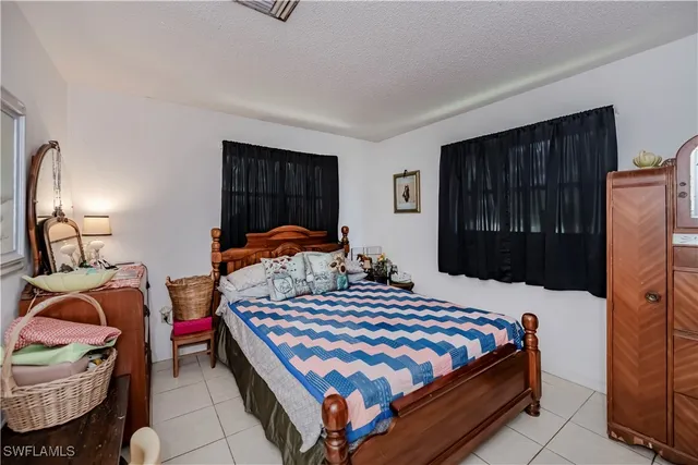 a bedroom with a bed and closet