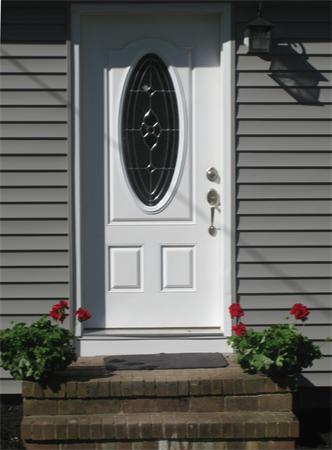 10 Silvermine Road Woburn, MA 01801 - Photo 3 of 14 a front view of a house with entryway