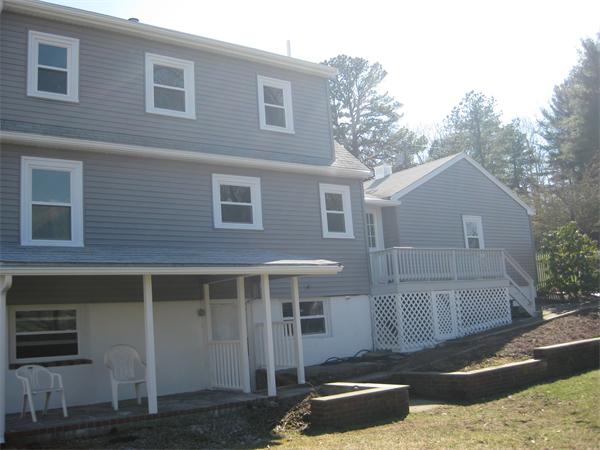 10 Silvermine Road Woburn, MA 01801 - Photo 5 of 14 a front view of a house with a yard