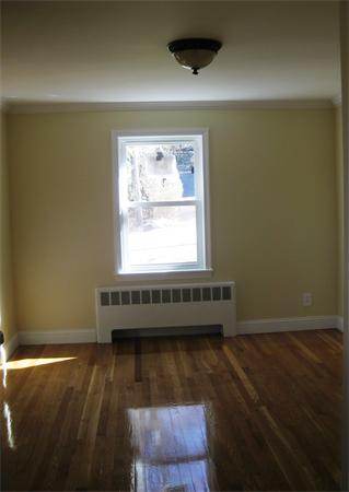 10 Silvermine Road Woburn, MA 01801 - Photo 8 of 14 a room with wooden floor and a window
