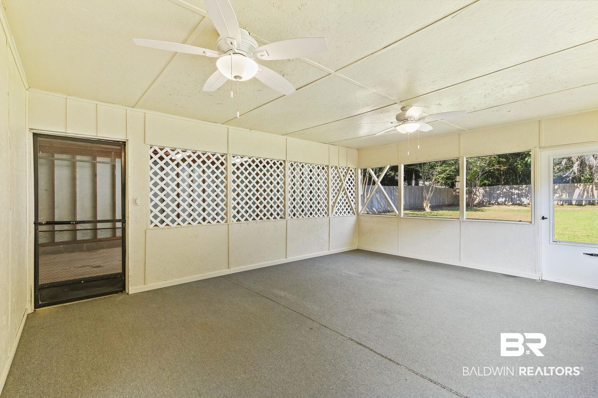 4366 Barden Avenue Mobile, AL 36619 - Photo 38 of 40 Unfurnished sunroom featuring ceiling fan