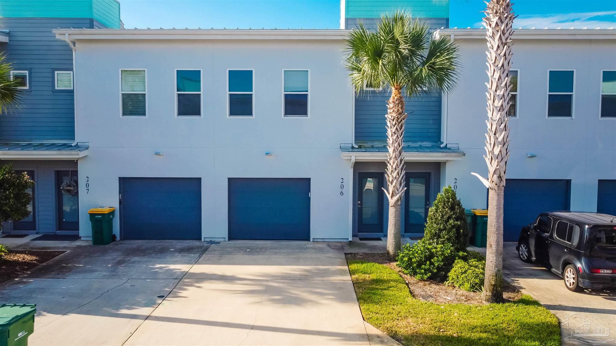 340 Bluefish Drive, Unit 206 Fort Walton Beach, FL 32548 - Photo 1 of 43 a house view with a outdoor space