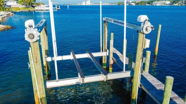 a view of a swimming pool with lounge chairs