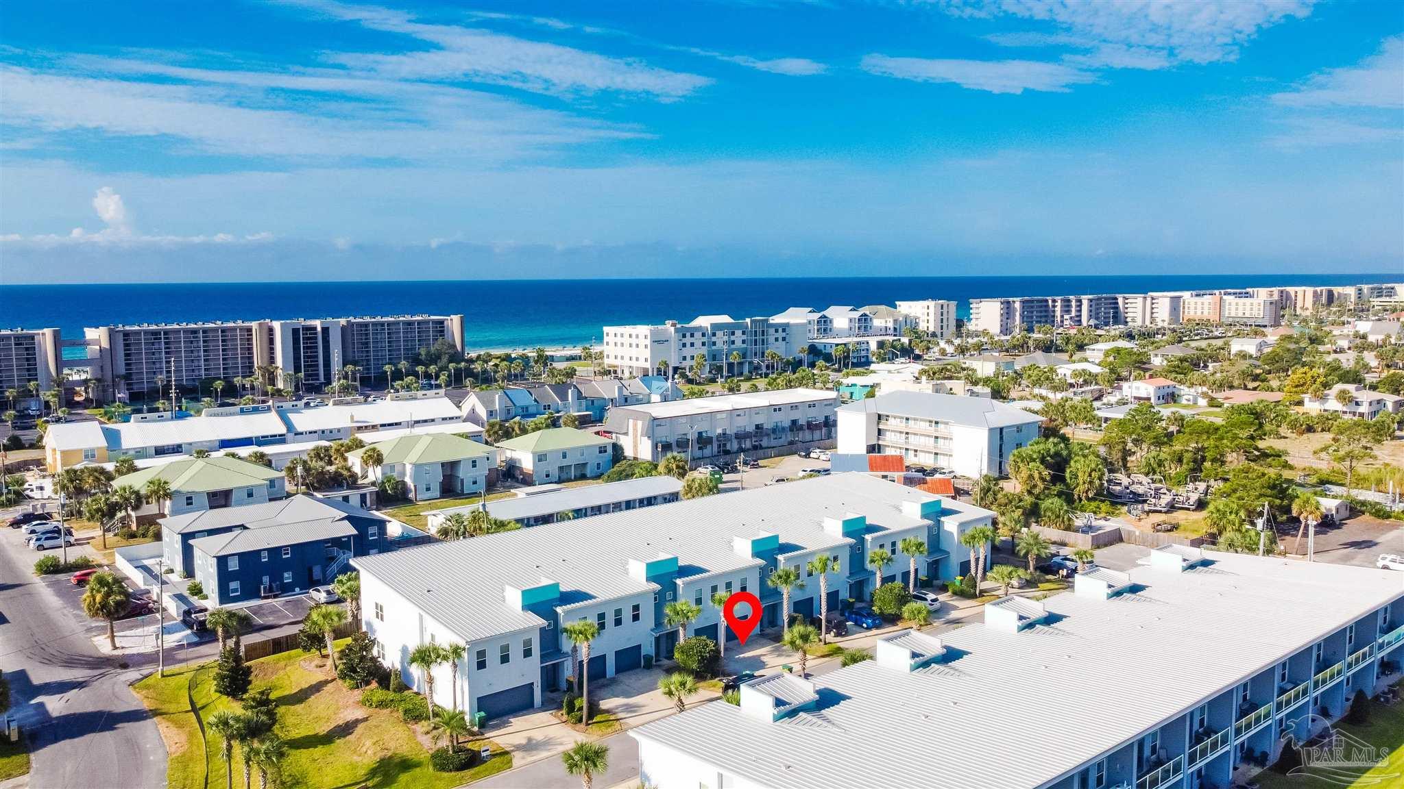 340 Bluefish Drive, Unit 206 Fort Walton Beach, FL 32548 - Photo 7 of 43 a view of swimming pool with outdoor seating