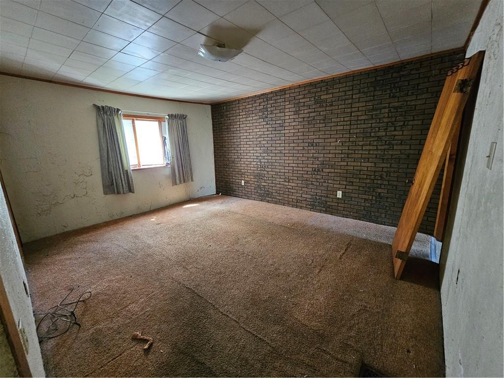 58 Elm Street Natrona Heights, PA 15065 - Photo 12 of 23 a view of empty room with windows
