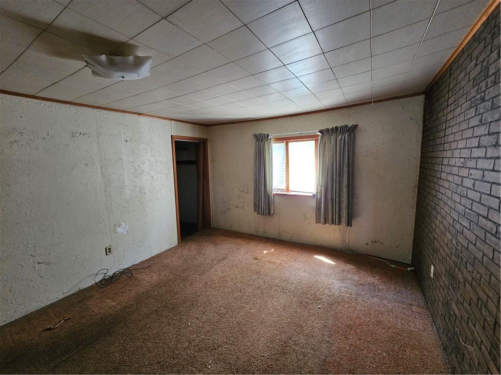 58 Elm Street Natrona Heights, PA 15065 - Photo 13 of 23 a view of empty room with windows