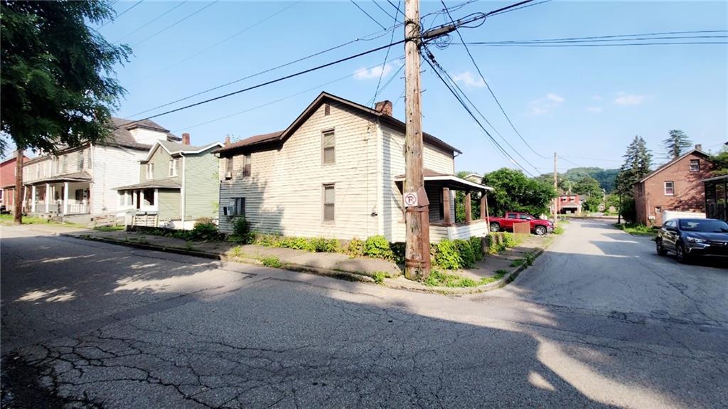 58 Elm Street Natrona Heights, PA 15065 - Photo 2 of 23 a view of a street with cars on road