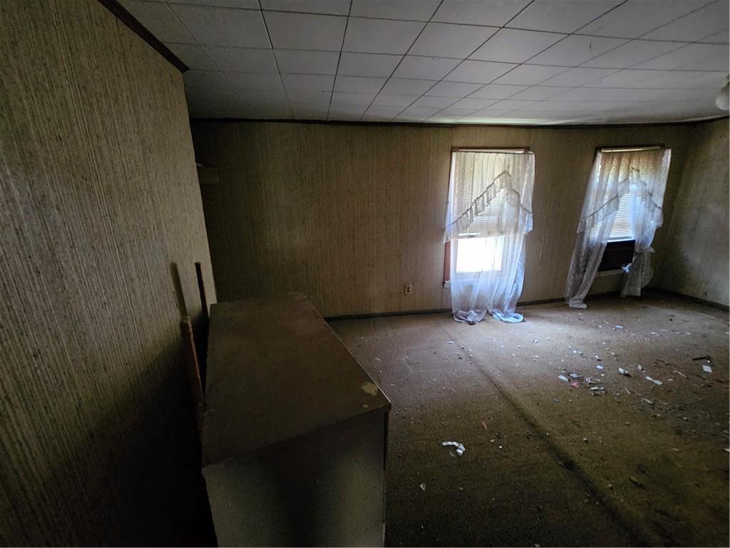 58 Elm Street Natrona Heights, PA 15065 - Photo 22 of 23 a view of empty room with windows