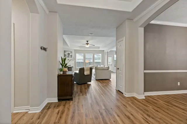a view of a living room and dining room